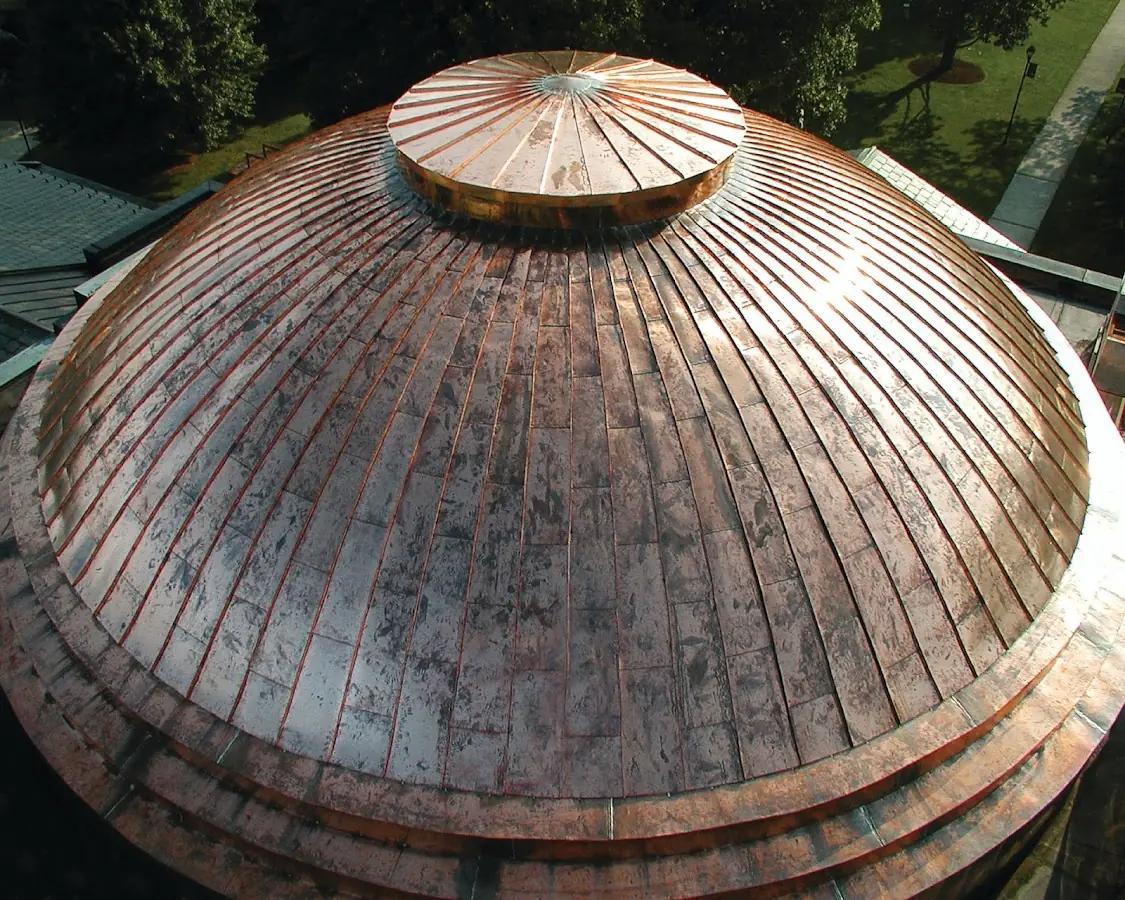 Craftsman Roofing crew installing a new roof in South Huntington